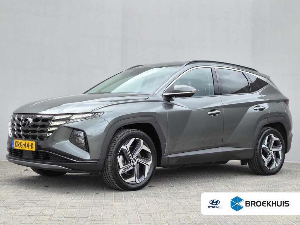 Hyundai Tucson 1.6 T-GDI PHEV Comfort Smart 4WD / SOH 100% / Dealer onderhouden / Fabrieksgarantie tot 06-2027 / Trekhaak afneembaar / Trekgewicht 1350 kg / Stuur- & Stoelverwarming / Achteruitrijcamera / Elektrische achterklep / Adaptief cruise control /