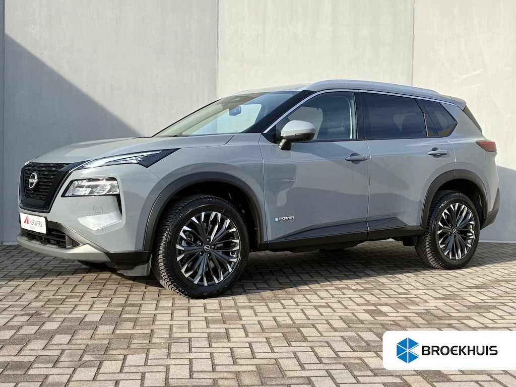 Nissan X-Trail 1.5 e-Power Tekna Fabrieksgarantie t/m 05-2028 / Apple Carplay/Android Auto / Adaptieve Cruise Control / Stoel-/Stuur-/Voorruitverwarming / Elektrische Achterklep / All-Season banden / Navigatie / Achteruitrijcamera /