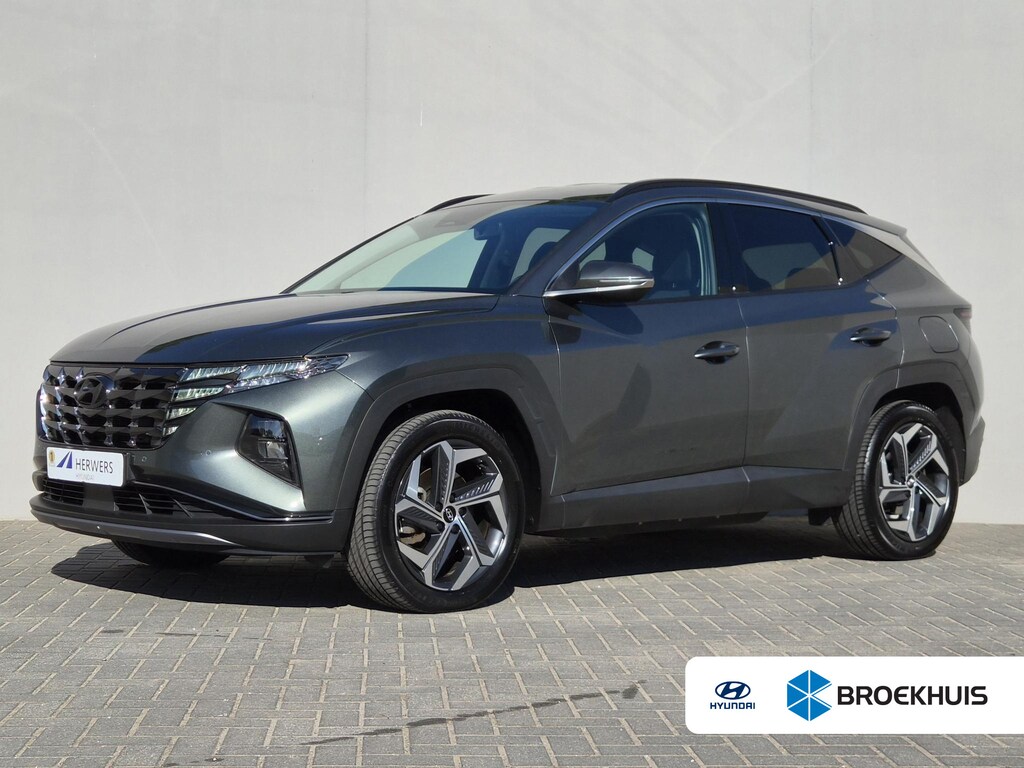 Hyundai Tucson 1.6 T-GDI PHEV Comfort Smart 4WD / SOH 100% / Dealer onderhouden / Fabrieksgarantie tot 05-2027 / Trekgewicht 1350 kg / Stuur- & Stoelverwarming / Achteruitrijcamera / Adaptief cruise control / Apple Carplay Android Auto / Keyless Entry/Start /