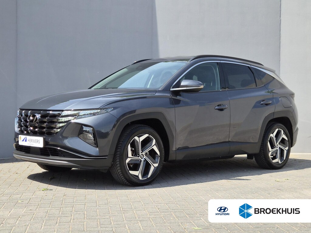 Hyundai Tucson 1.6 T-GDI PHEV Comfort Smart 4WD / Dealer onderhouden / Fabrieksgarantie tot 05-2027 / All season banden / Stuur- & Stoelverwarming / Trekgewicht 1350 kg / Elektrische achterklep / Achteruitrijcamera / Apple Carplay Android Auto /