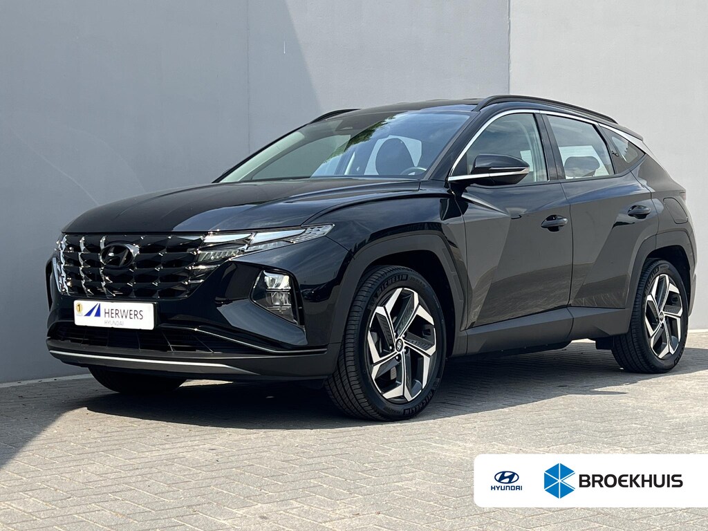 Hyundai Tucson 1.6 T-GDI PHEV Comfort 4WD / Fabrieksgarantie tot 07-2027 / Accu SoH 100 % / 1.350 kg trekgewicht / Navigatie / Stuur- & Stoelverwarming / Apple Carplay Android / 19" LM wielen /
