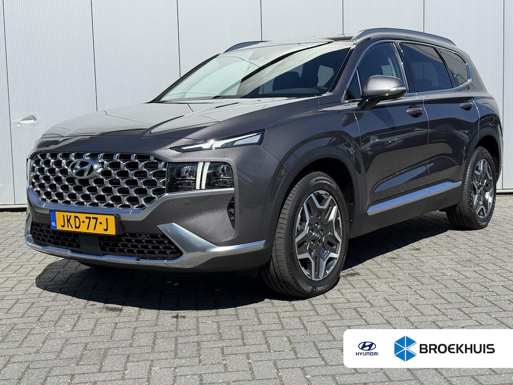 Hyundai Santa Fe 1.6 T-GDI PHEV Premium / AWD / Fabrieksgarantie tot 1/7/2027 / Dealer onderhouden  / EAER 58km / Apple Carplay Android Auto / Adaptief CC / Achteruitrijcamera / Stuur- Stoel en Achterbankverwarming / Elektrische achterklep / Trekgewicht 1350 kg / Climate control /