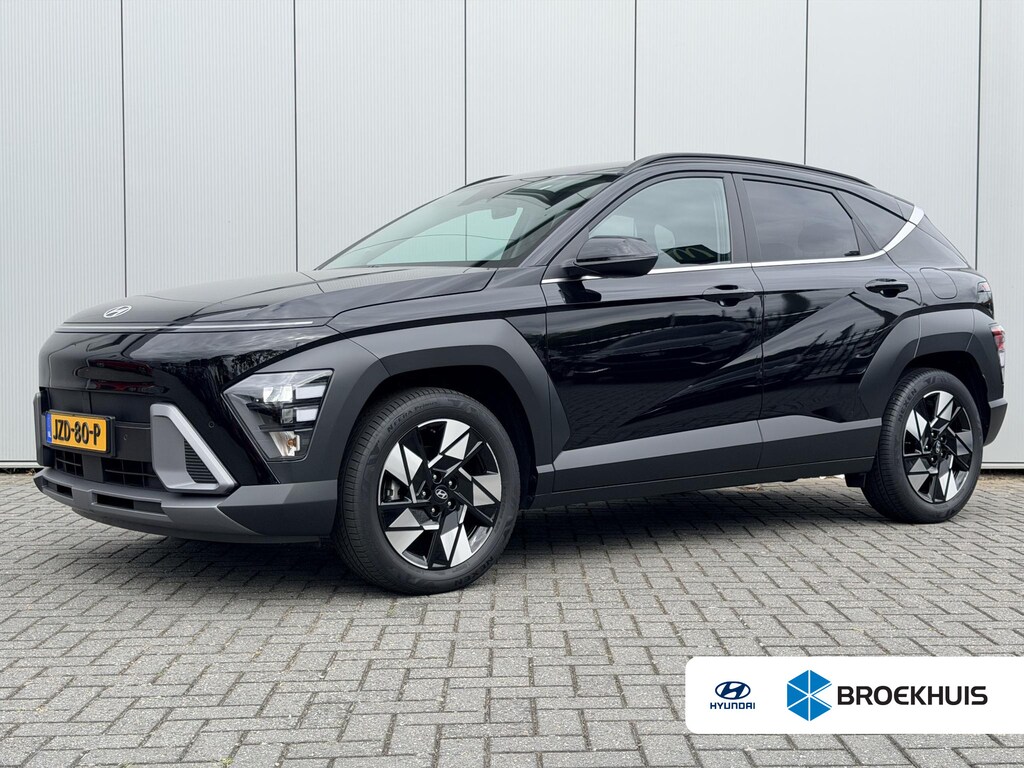 Hyundai Kona 1.6 GDI HEV Comfort Smart / Fabrieksgarantie tot 2-2030 / Stoel- & Stuurverwarming / Navigatie / Achteruitrijcamera / Adaptive Cruise Control / Climate Control / LED Verlichting /