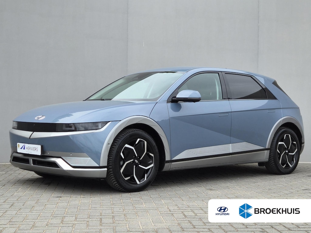 Hyundai Ioniq 5 Connect+ 77.4 kWh / SOH 100% / Dealer onderhouden / Fabrieksgarantie tot 12-2028 / CCS snelladen / All season banden / Elektrische achterklep / Rondomzicht camera / Warmtepomp / Climate control / Stuur- Stoel & Achterbank verwarming / Adaptief cruise control /