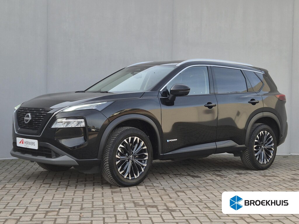 Nissan X-Trail 1.5 e-Power Tekna / Fabrieksgarantie tot 05-2028 / Dealer onderhouden / All Season banden / Stuur-, Stoel en Achterbank verwarming / Head Up Display / Elektrische achterklep / Rondomzicht camera / Adaptief CC /