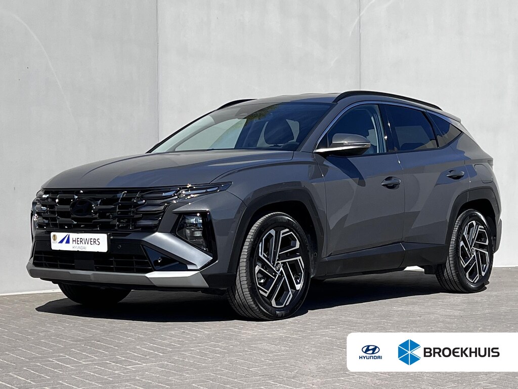 Hyundai Tucson 1.6 T-GDI HEV Premium / Facelift Nieuw model / Fabrieksgarantie tot 7-2029 / Dealer onderhouden / Navigatie / Stuur- en stoelverwarming / Elektrische klep / Adaptieve CC / 19"LM wielen /