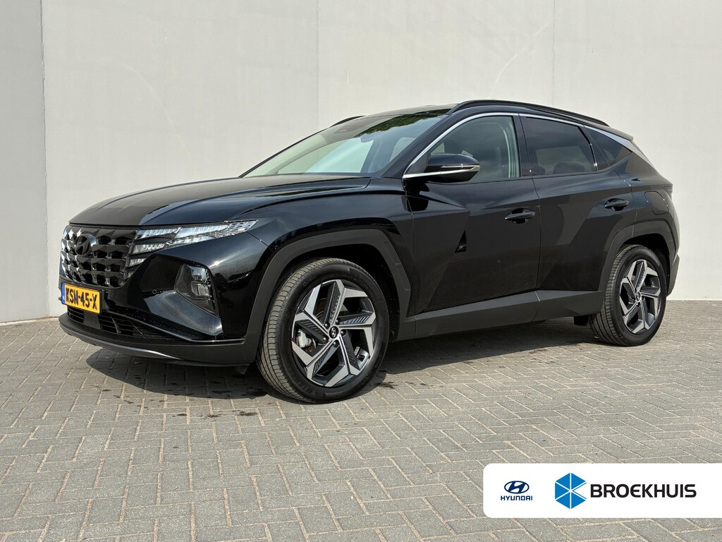 Hyundai Tucson 1.6 T-GDI PHEV Comfort Smart 4WD / Fabrieksgarantie tot 05-2027 / Dealer onderhouden / Navigatie / Camera / Apple Carplay/Android Auto / Stuur- en stoelverwarming / 19" LM wielen /