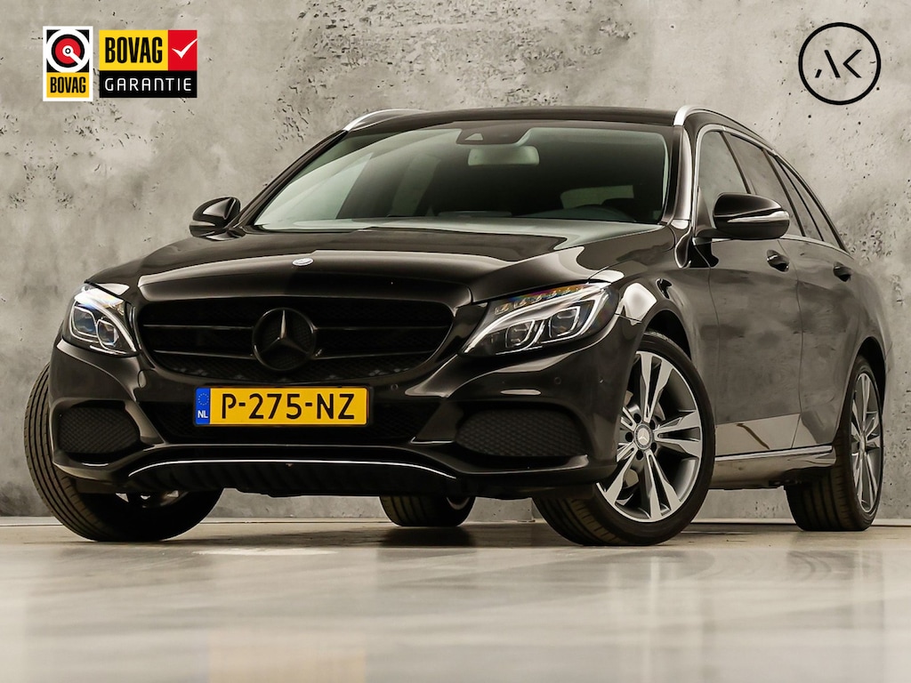 Mercedes-Benz C-klasse 180 AMG Sport Automaat (GROOT NAVI, LEDER, STOELVERWARMING, GETINT GLAS, SPORTSTOELEN, CRUISE, NIEUWE APK, NIEUWSTAAT)