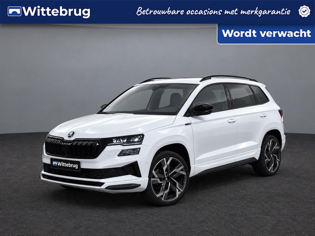 Skoda Karoq 1.5 TSI 150pk ACT Sportline Business / Leder Verwarmbare stoelen vóór en achter / Virtual Cockpit / Panorama dak / Elec. Trekhaak / 19'' LMV