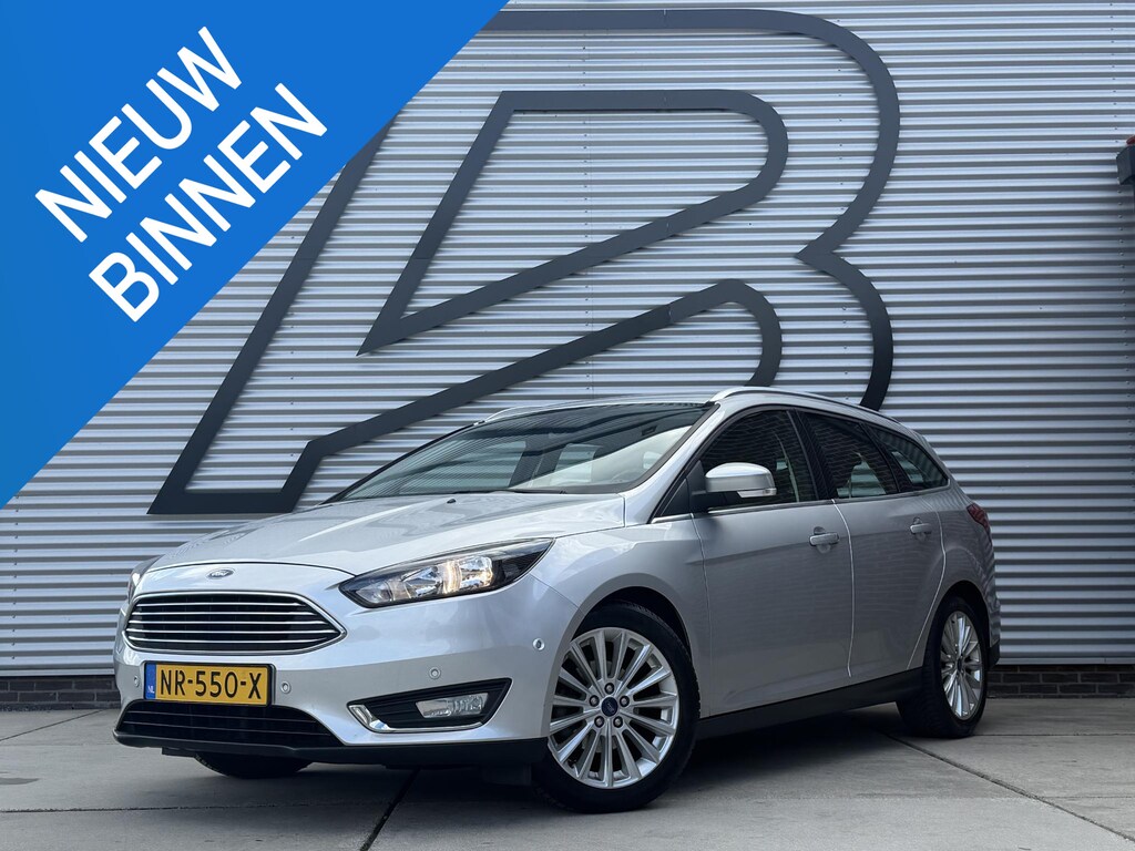 Ford Focus Wagon 1.0 Titanium 2e Eigenaar|Navi|Clima|Cruise|PDC V+A|Trekhaak|N.A.P|APK tot 03-2027