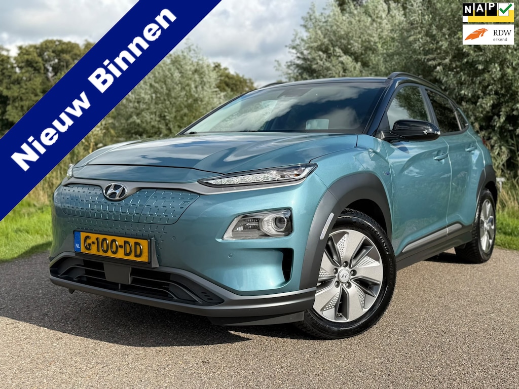 Hyundai Kona Electric EV Premium 64 kWh Long Range / SoH 97.8% / Automaat / Camera / Stoelverwarming - Airco / Leder / PDC /