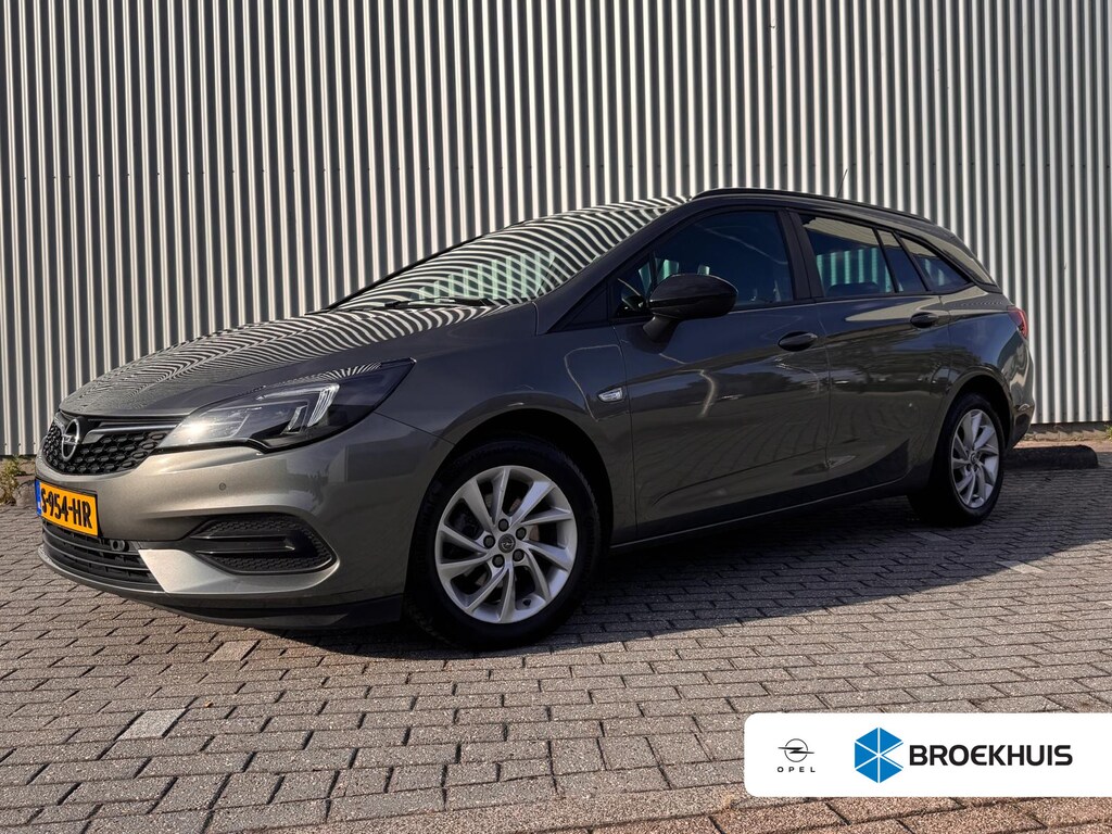 Opel Astra Sports Tourer 1.2 Business Edition | Trekhaak | Stoel/Stuurverwarming | Navigatie | Camera | Cruise Control | | DAB ontvanger | Dakrails | Electronic climate controle