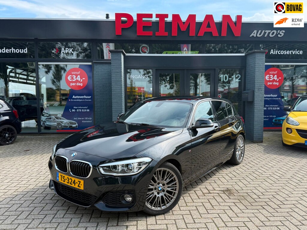BMW 1-Serie 118i High Executive | M Sport shadow | Stoelverwarming | Climate control |Navigatie | DAB |