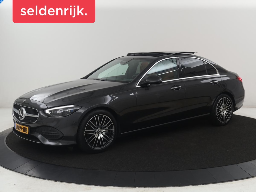Mercedes-Benz C-klasse 200 Luxury Line | Panoramadak | Leder | Memory | Adaptive cruise | Stoelverwarming | Burmester | 360 camera | Park assist | Sfeerverlichting | Carplay | Climate control