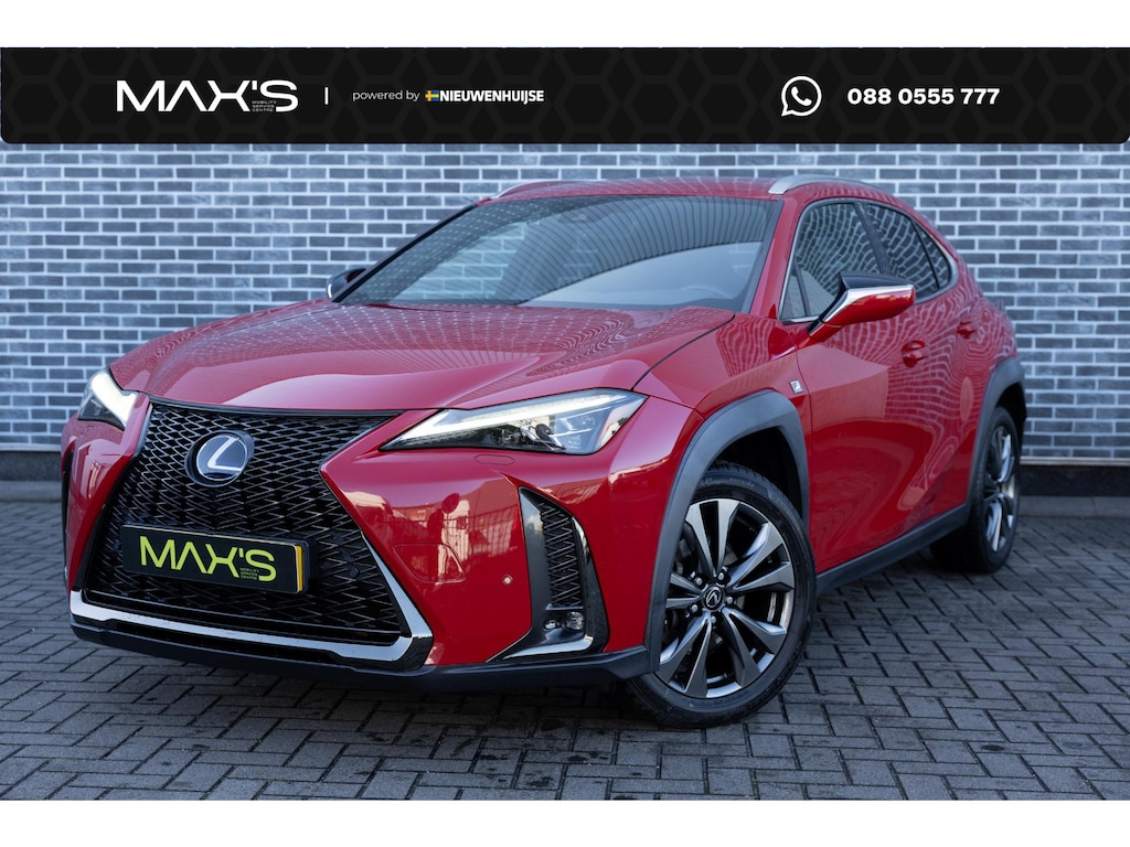 Lexus UX 250h F Sport First Edition | Triple LED Koplampen | Achteruitrijcamera | Parkeersensoren | Keyless Entry | Elektrische Achterklep | Elektrisch Verstelbare Voorstoelen | Stoelverwarming | Cruise Control Adaptief | Dodehoekdetectie | Navigatie