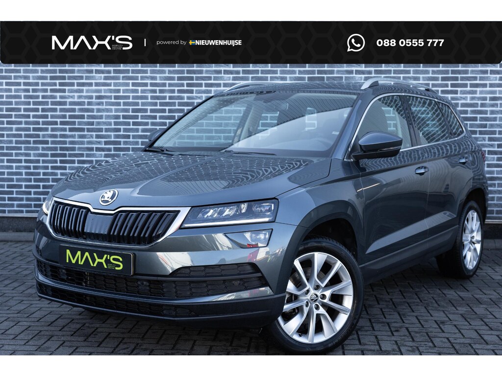 Skoda Karoq 1.5 TSI DSG Style Business | Trekhaak | Panoramadak | Achteruitrijcamera | Parkeersensoren | Keyless Entry | Elektrische Achterklep | Canton Audio | LED Koplampen | Stoelverwarming | Navigatie | Apple Carplay | Android Auto