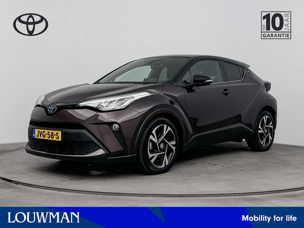 Toyota C-HR / C-HR+ 1.8 Hybrid Style | Half Leder/Alcantara bekleding | Elektrisch verstelbare stoel | Stoel+stuurverwarming | Navigatie | Apple CarPlay/Android Auto | Cruise Control Adaptive | Trekhaak afneembaar |