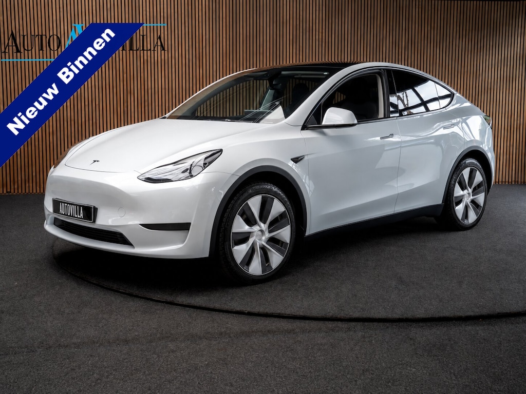 Tesla Model Y Long Range Dual Motor AWD 351pk Navi Camera Leer Warmtepomp ACC Autopilot PDC Elektr. achterklep Stoelverwarmimg voor en achter Stuurverwarming BTW auto SoH is 93,6%