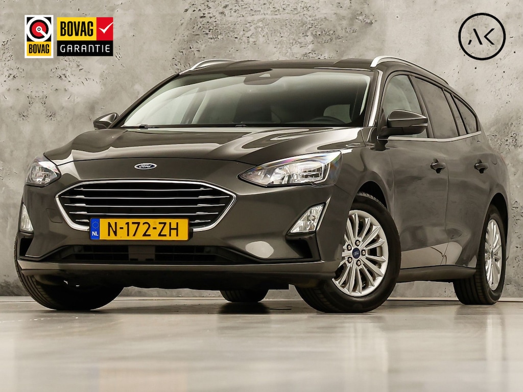 Ford Focus Wagon 1.0 EcoBoost Titanium X Sport Automaat (APPLE CARPLAY, GROOT NAVI, CAMERA, STUUR/STOELVERWARMING, KEYLESS, SPORTSTOELEN, GETINT GLAS, LANE ASSIST, NIEUWSTAAT)