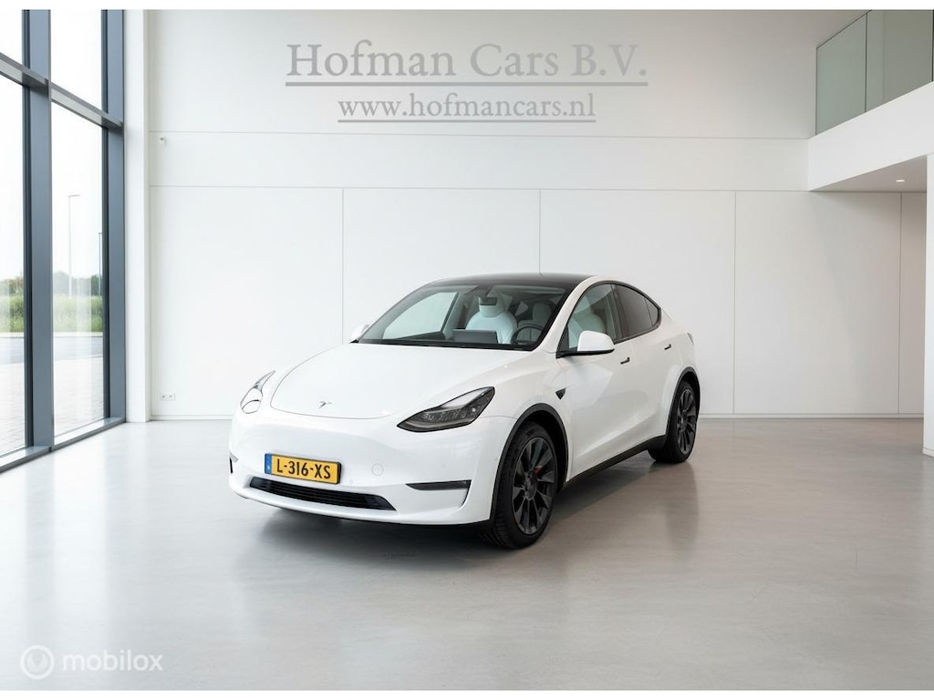 Tesla Model Y Long Range AWD | 75 kWh | SOH 88% | Warmtepomp | 20" | Wit Leder
