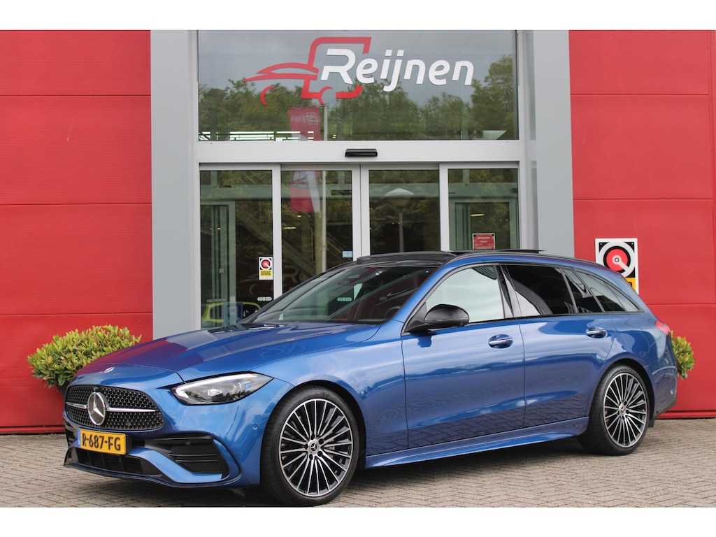 Mercedes-Benz C-klasse Estate 200 218PK Launch Edition AMG Line | FULL LEDEREN BEKLEDING | PANORAMISCH SCHUIF/KANTELDAK | LASER KOPLAMPEN | SFEERVERLICHTING | ELEKTRISCH VERSTELBARE VOORSTOELEN MET GEHEUGEN OP BEIDE STOELEN | STOELVERWARMING | ELEKTRISCHE STUURVERSTELLING MET GEHEUGEN | 19'' MULTISPAAKS LICHTMETALEN VELGEN | VERKEERSLICHTEN WEERGAVE | 360° CAMERA | DRAADLOOS APPLECARPLAY/ANDROID AUTO | DRAADLOZE TELEFOONLADER | WIDE SCREEN SCHERM | NIGHT PAKKET | DODEHOEK DETECTIE | EXTRA GETINTE ACHTERSTE RUITEN | PREMIUM AUDIO SYSTEM | ELEKTRISCH BEDIENBARE ACHTERKLEP | KEYLESS ENTRY |