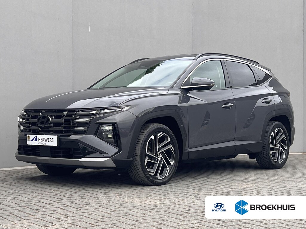 Hyundai Tucson 1.6 T-GDI PHEV Premium 4WD / Accu SoH 100 % / EAER 65 km / Leder / HUD / Navigatie / Apple Carplay Android / Stoelventilatie / Stuur-, stoel- & achterbankverwarming / 19" LM wielen & All Season banden /