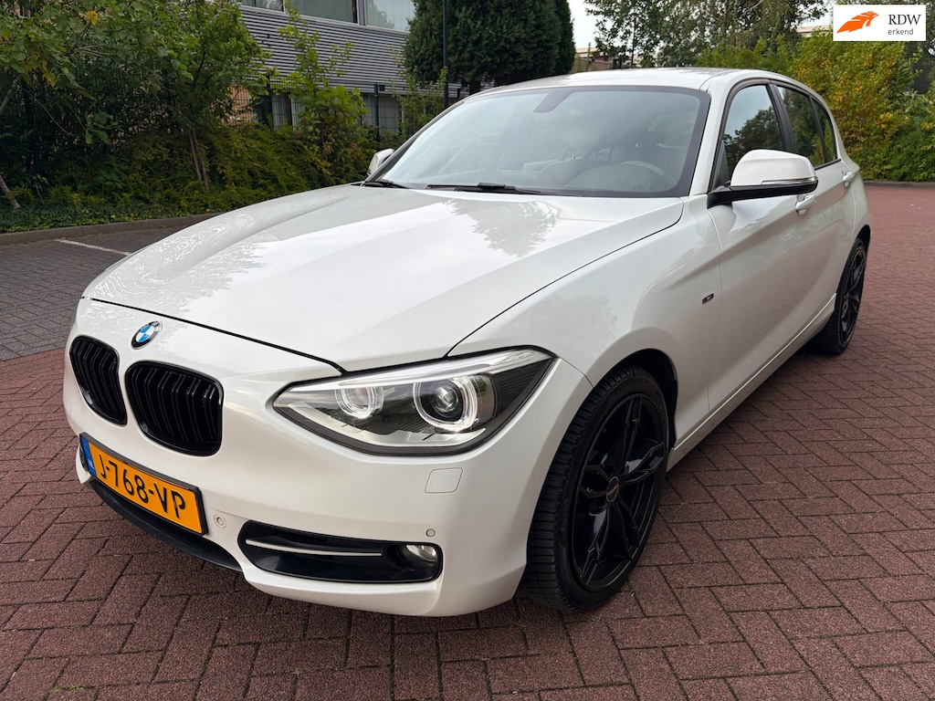 BMW 1-Serie 118i High Executive / Automaat / Navi / Leder bekl. / LED