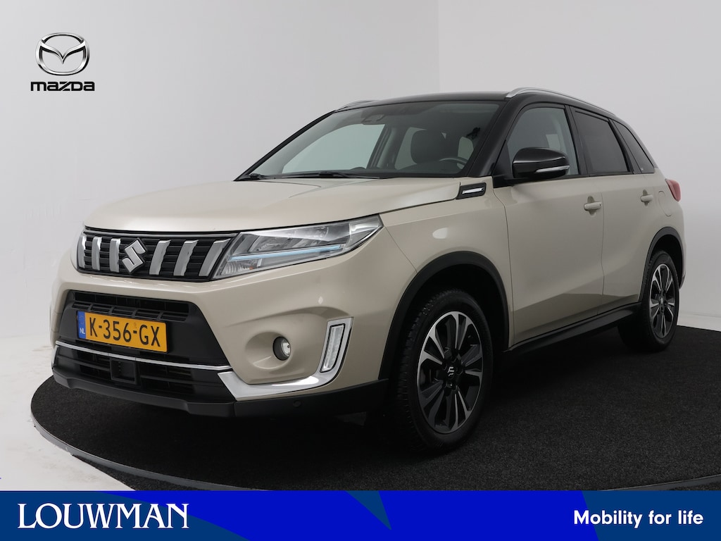 Suzuki Vitara 1.4 Boosterjet Style Smart Hybrid | Trekhaak | Camera | Stoelverwarming | Navigatie |