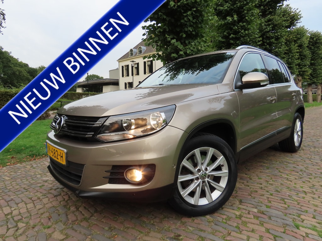 Volkswagen Tiguan 1.4 TSI Track&Field 4Motion Leer Panoramadak/Schuif Parkassist Stoelverwarming Ecc Cruisecontrol Navigatie Pdc Lm Velgen Trekhaak