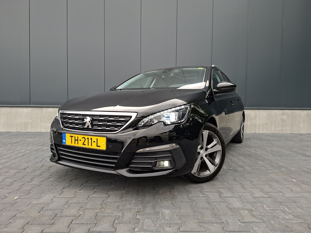 Peugeot 308 SW 1.2 Distibutieriem vervangen | Trekhaak | Carplay | Lederen bekleding | All seasonbanden