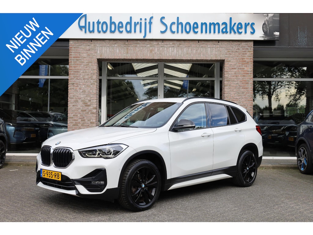 BMW X1 sDrive18i High Executive TREKHAAK-AFN STOELVERW. CAMERA ELEC.KLEP NAVI CRUISE DAB CRUISE CLIMA 2XPDC 18''LMV