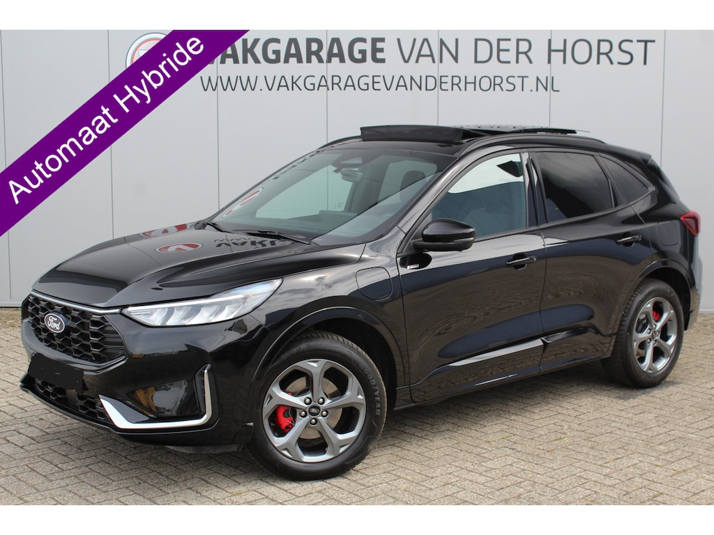 Ford Kuga 2.5-243pk PHEV ST-Line X. Febr. 2026, slechts 9.000km ! Autm. airco dual, elektr. panodak, elektr. trekhaak, elektr. achterklep, leer/alcantara, klep, LED verl., navigatie, telefoonvoorb., stoel-, stuur-, voorraam- en achterbankverw., side- en lan
