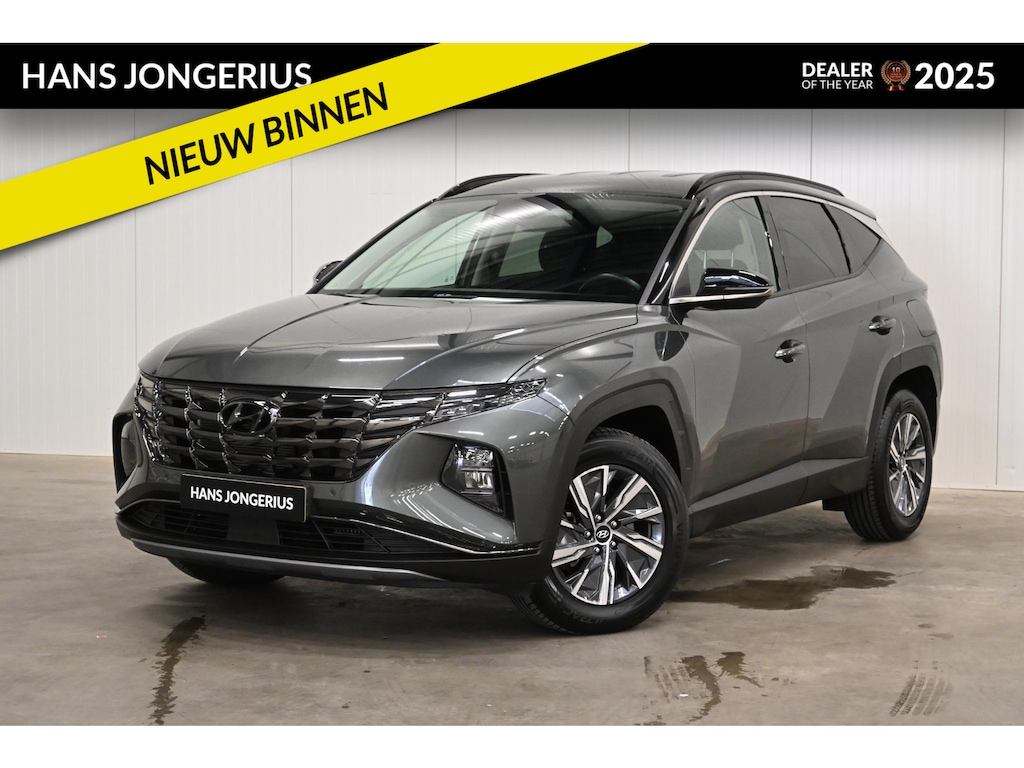 Hyundai Tucson 1.6 T-GDI HEV Comfort Smart | CAMERA | STUUR/STOELVERWARMING | NAVI | ADAPT. CRUISE CONTROL | CLIMATE CONTROL | PDC | LMV