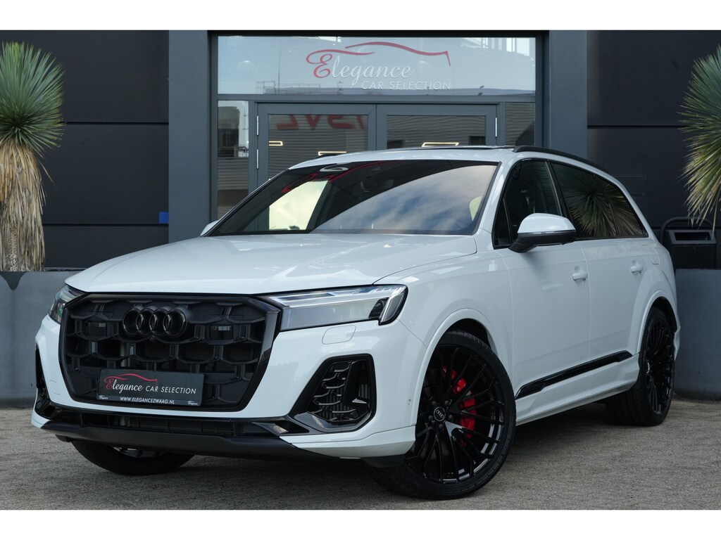 Audi Q7 55 TFSI e Quattro Pro Line S | Facelift | 394pk | Pano | Trekhaak | HUD | 360° | Een bijzonder complete en luxe uitgevoerde Audi Q7 55 TFSI e quattro Pro Line S, uitgevoerd in wit metallic met een stijlvol zwart interieur. Deze krachtige plug-in hybride combineert het ver