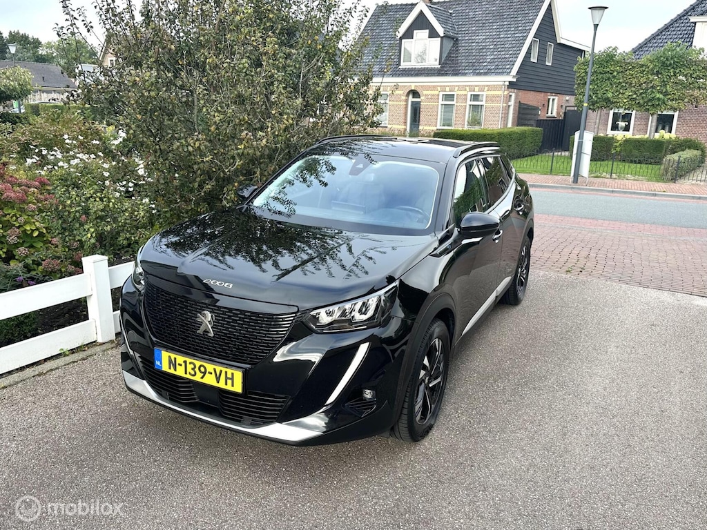 Peugeot e-2008 EV Allure Pack 50 kWh CARPLAY ACHTERUITRIJ CAMERA PRIVACY GLAS ACCU GARANTIE MOOIE AUTO!!