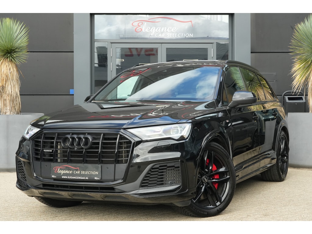 Audi Q7 60 TFSI e Quattro Pro Line S Competition | 489 PK | PHEV | Audi Exclusive | Pano | 360° Camera | Trekhaak Audi Q7 60 TFSI e quattro Pro Line S Competition 489 PK Plug-in Hybrid met 3.0 V6 benzinemotor en 8-traps automatische transmissie, voorzien van een zeer luxe Audi Exclusive interieur, panora