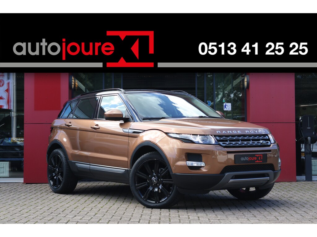 Land Rover Range Rover Evoque 2.0 Si 4WD Sicilian Yellow | Schuifdak | Leder | Camera | Trekhaak | Meridan Audio | Pack Winter |