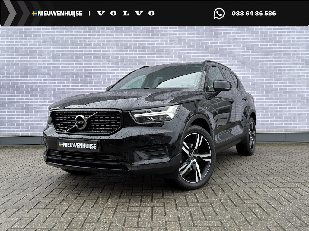 Volvo XC40 T3 R-Design Aut | Trekhaak | Stoel- en Stuurverwarming | Achteruitrijcamera | Parkeersensoren Voor en Achter | 19 Inch Velgen | Voorruitverwarming | Getint Glas | Keyless | Navigatie | Apple Carplay / Android Auto | Nubuck Bekleding |
