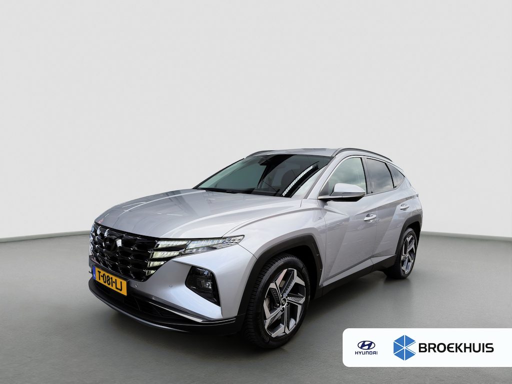 Hyundai Tucson 1.6 T-GDI 180pk Automaat MHEV 4WD Premium | Carplay | Camera | Adaptive Cruise | Leder | 19-inch velgen | Handsfree achterklep | Stoelverwaming/ventilatie | Trekhaak | Premium Audio | DAB | BLIS | Draadloze telefoonlader