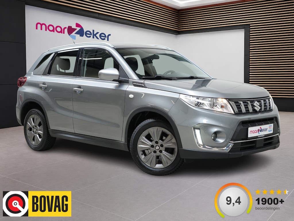 Suzuki Vitara Exclusive 2WD ✅Stoelverw.✅Camera✅Cruise✅Afn. Trekhaak✅