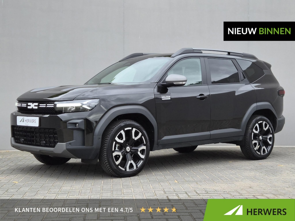 Dacia Bigster 1.8 Hybrid 155 Journey / Fabrieksgarantie tot 12-2028 / All season banden / Elektrische achterklep / Stuur- Stoel & Voorruitverwarming / Achteruitrijcamera / Adaptief cruise control / Keyless Entry/Start / Draadloze telefoon lader /