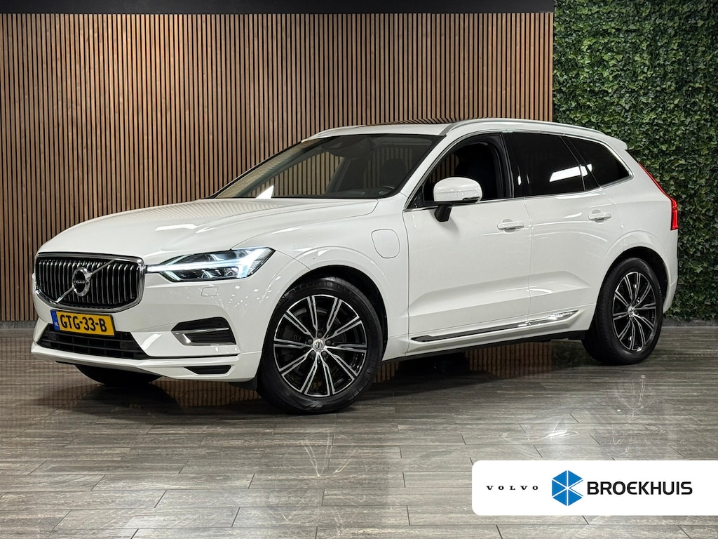 Volvo XC60 T8 AWD Recharge Inscription | Luchtvering | Trekhaak | Crystal White | Harman Kardon | Adaptieve Cruise Control | Standkachel met Volvo On Call App | Parkeercamera | Pilot Assist | BLIS Dode Hoek Detectie | Stoelverwarming | Full LED meesturende koplampen | Bestuurdersstoel elektrisch geheugen | Contour stoelen | Zitting verlenging voorstoelen | Lederen Dashboard | Schuifdak | 19 Inch | Keyless Drive | Parkeersensoren voor+achter | Privacy Glass | Elektrisch bedienbare achterklep | DAB Radio | Apple Carplay/Android Auto | Crystal White Metallic |