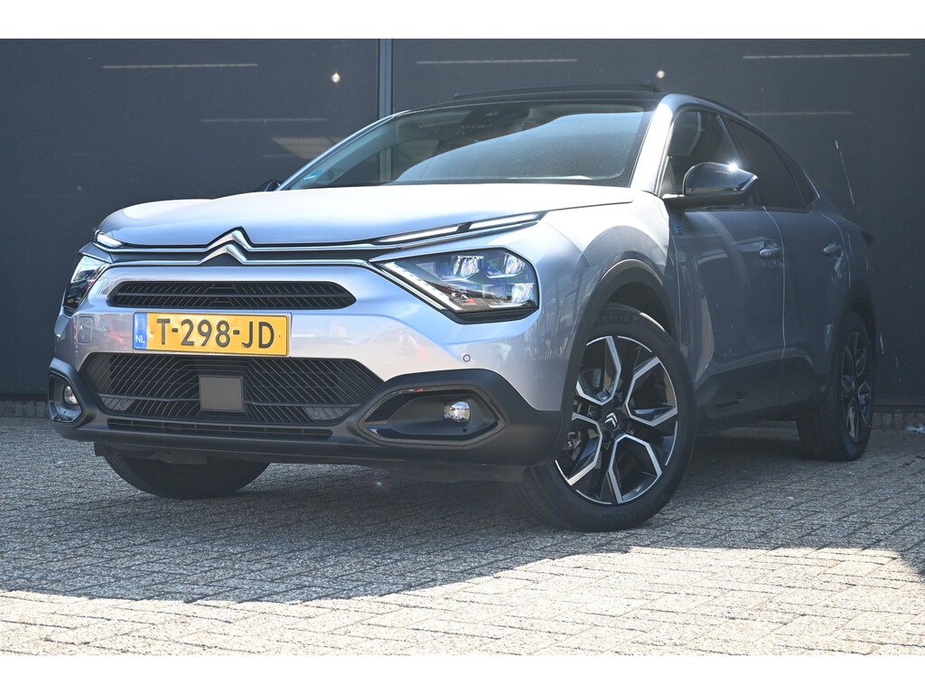 Citroën E-C4X ë-C4 X Shine 50 kWh 97,7%SOH! 3 Fase | Schuif-/Kanteldak | Navigatie | Leder | HUD | Stoel/Stuurverwarming | !!