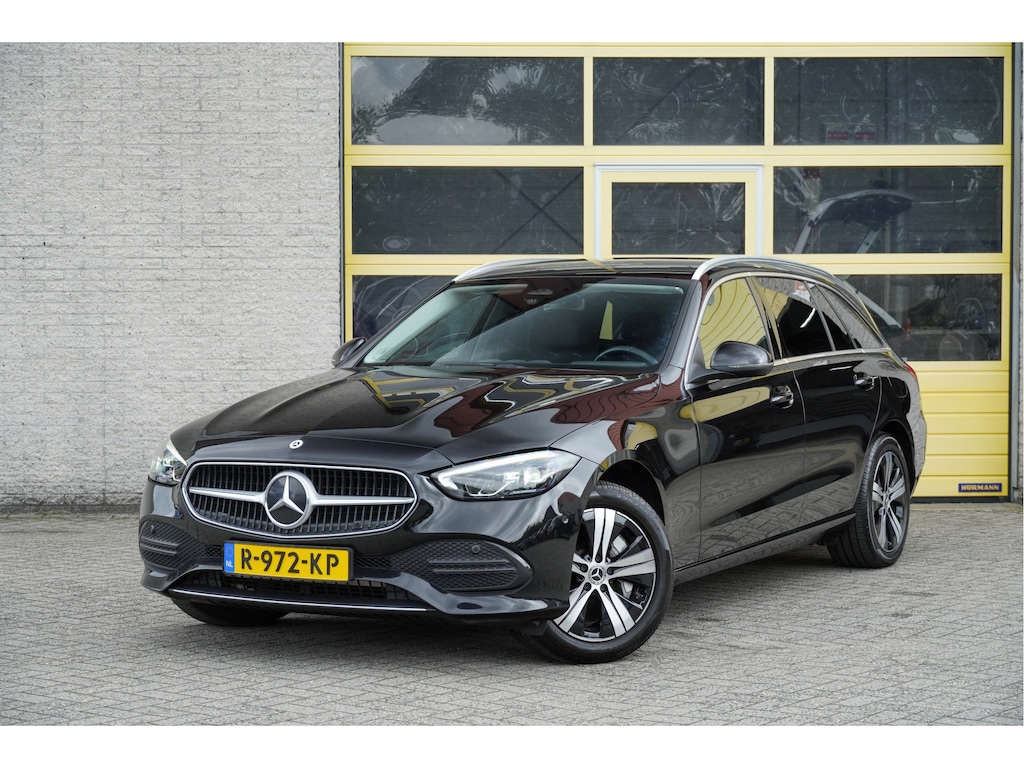 Mercedes-Benz C-klasse Estate 300 e 204PK! Automaat Luxury Line Limited BJ2022 Lmv 17" | Led V+A | Pdc | Elek. achterklep | Achteruitrijcamera | App-Connect | Navi | Virtual cockpit | Sfeerverlichting | Cruise control | Verwarmde voorstoelen | Nw-model! | SoH 94.6% + 2 laadkabels!
