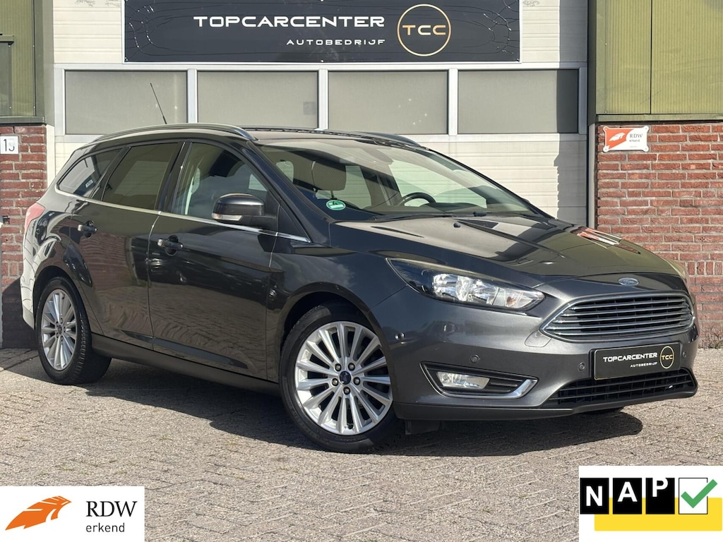 Ford Focus Wagon 1.0 Titanium/AIRCO/NAVI/PARKS/CRUISE/APK/NAP