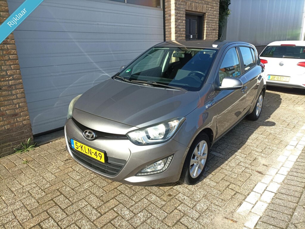 Hyundai i20 1.2i i-Deal Airco/Cruise NL-Auto APK 9-2027