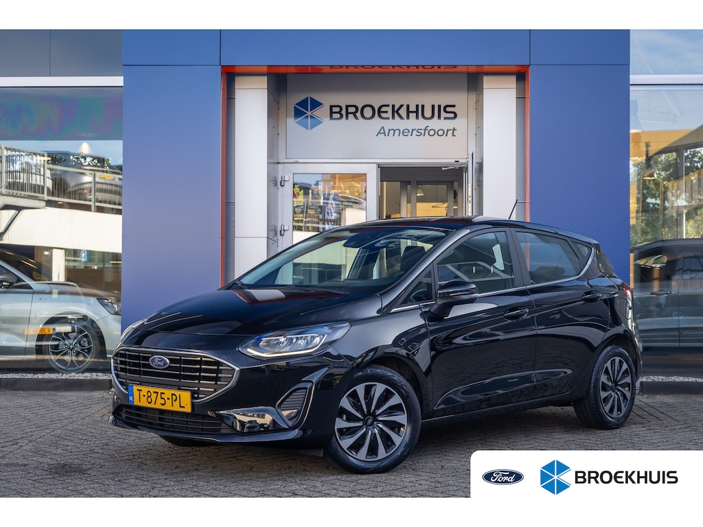 Ford Fiesta 1.0 EcoBoost Hybrid Titanium | Apple Carplay/Android Auto | Keyless | Stoel- Stuurverwarming | | Airco (automatisch) | Apple Carplay/Android Auto|telefoonintegratie premium | Keyless entry