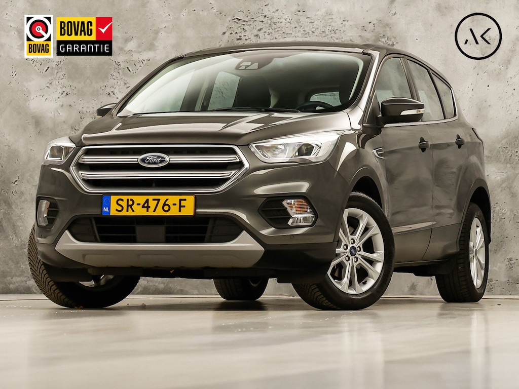 Ford Kuga 1.5 EcoBoost Titanium (APPLE CARPLAY, NAVIGATIE, CLIMATE, CAMERA, ADAPTIVE CRUISE, LEDER, SPORTSTOELEN, KEYLESS, LM VELGEN, NIEUWSTAAT)