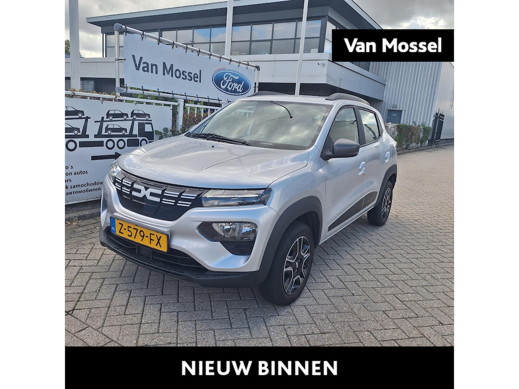 Dacia Spring Expression 27 kWh | SOH 92% | Navigatie | All Weather Banden | Lederen Bekleding | Achteruitrijcamera | Cruise Control |