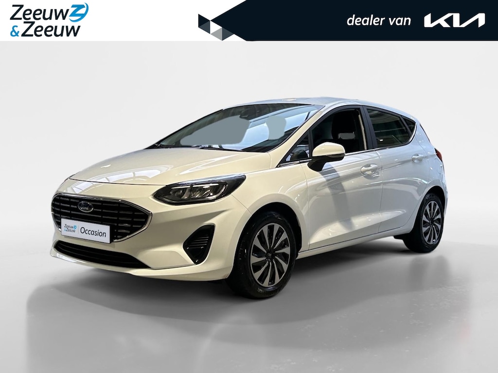 Ford Fiesta 1.0 EcoBoost Hybrid Titanium | Apple Carplay / Android Auto | Stoel + Stuurverwarming | Cruise Control | Parkeersensoren Achter | Lichtsensor | Climate Control | Verwarmbare Voorruit